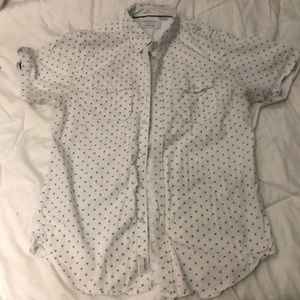 White button down, black accent marks